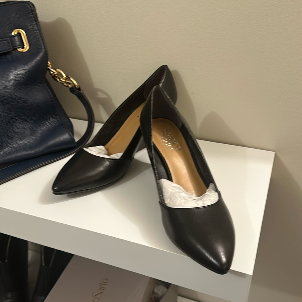 NEW. black wedge Franco Sarto heels. Classy and comfort. Comes with box.